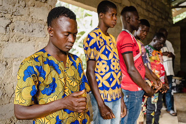 Men praying